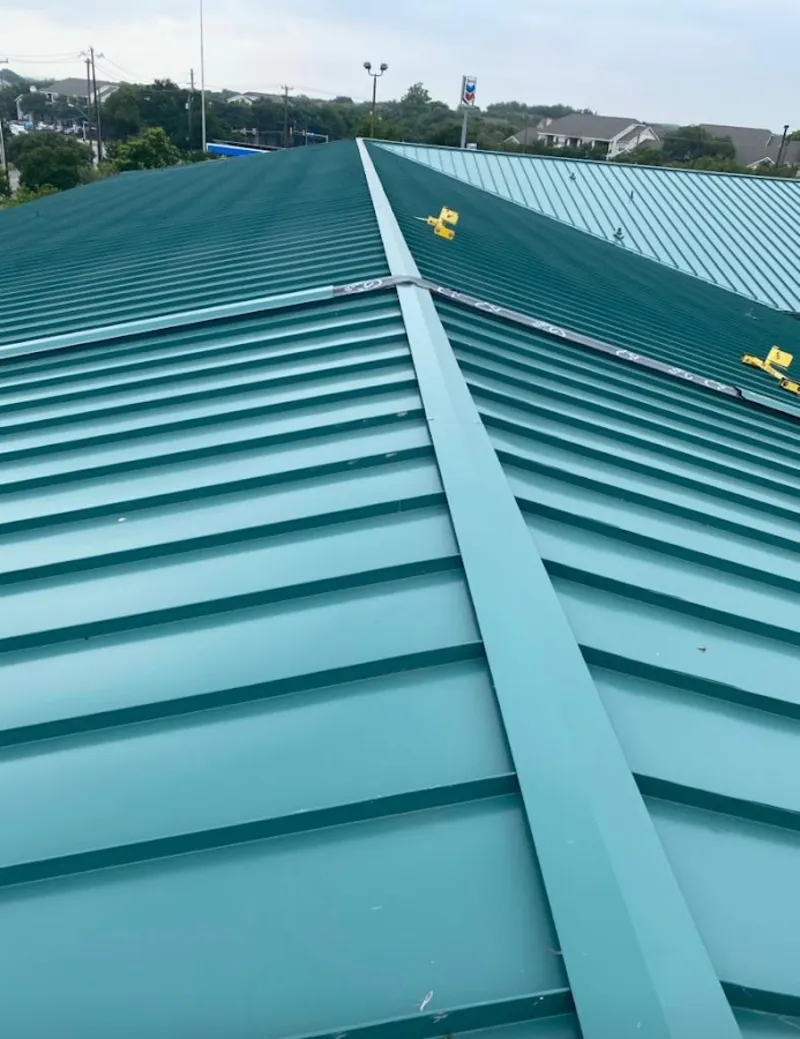 Green commercial metal roof ridge and valley for Metal Roof Repair in Bullard